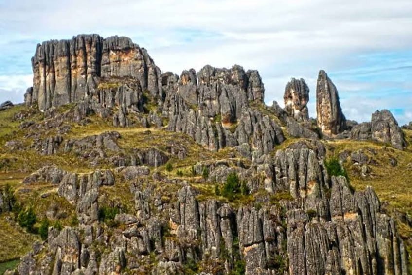A rugged mountainous landscape with prominent rock formations. 4