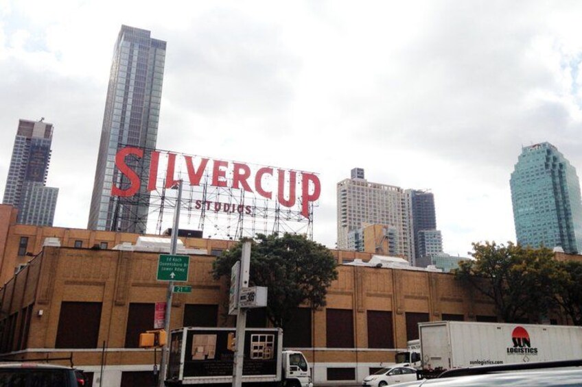 A cityscape with the Silvercup Studios building and surrounding high-rise buildings. 4
