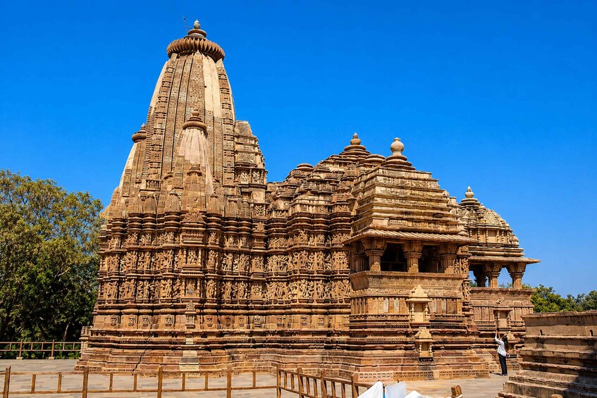 A large, intricately carved temple with multiple spires and detailed sculptures. 3