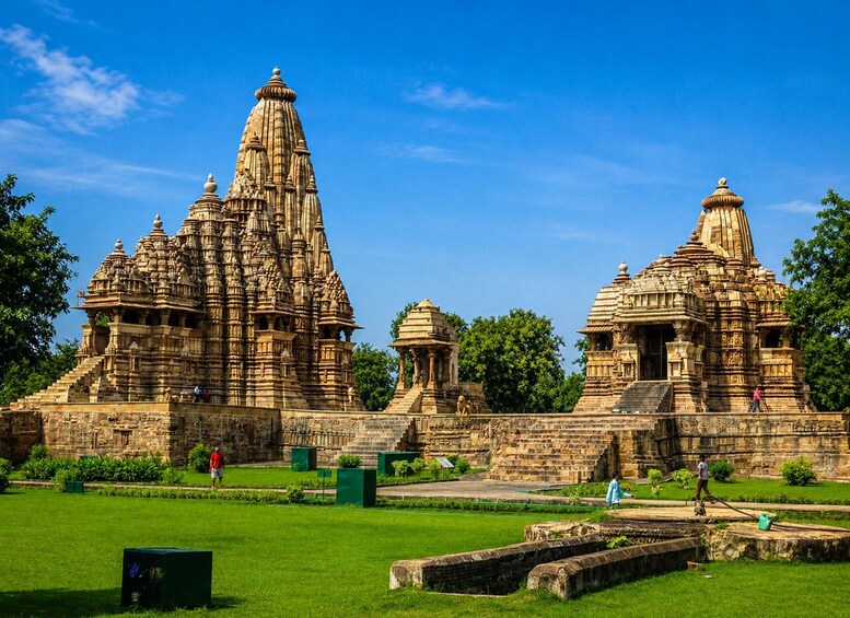 A large, intricately carved temple complex with multiple spires and detailed stonework. 5