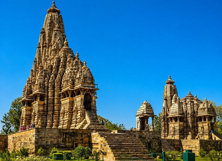 A large, intricately carved temple with multiple spires and detailed stonework. 1