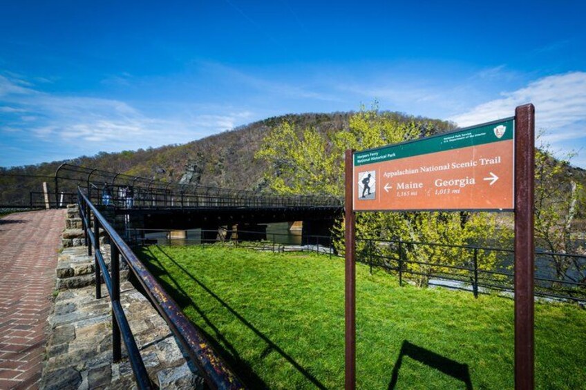 A sign for the Appalachian National Scenic Trail pointing towards Maine and Georgia. 4