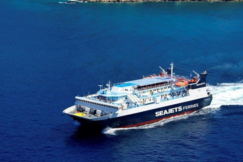 A ferry named 'SEAJETS FERRIES' traveling on a body of water. 1