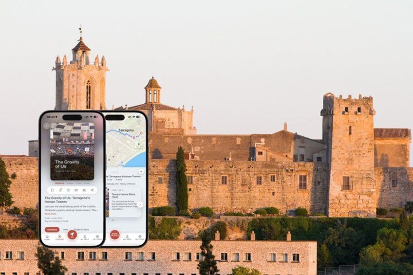 A smartphone displaying a map with a view of a historic castle and a church. 1