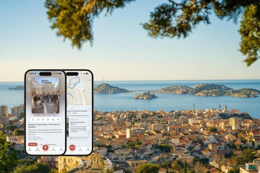 A smartphone displaying a map and a scenic coastal cityscape with hills and a clear sky. 1