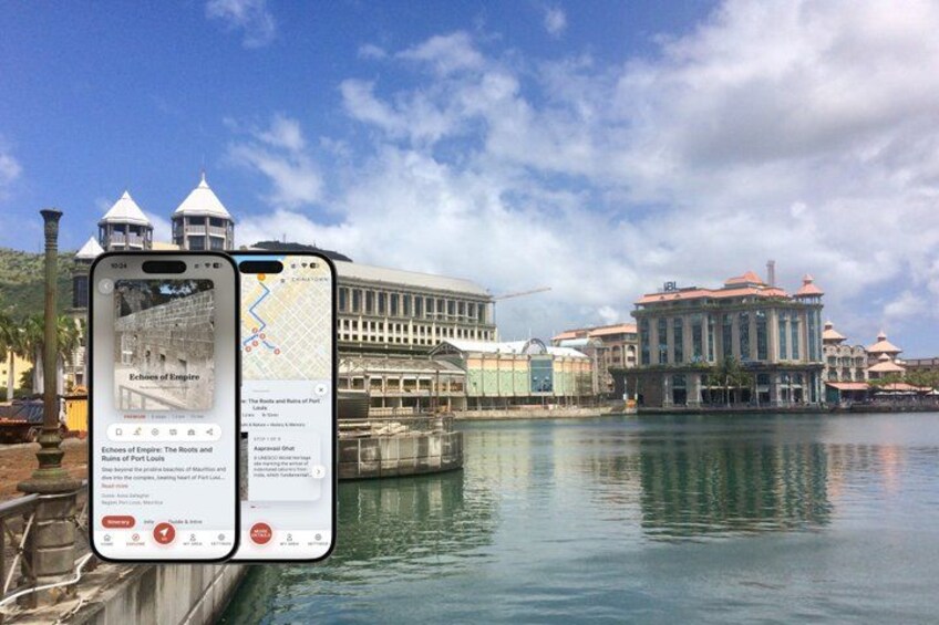 A smartphone displaying a map with a view of a waterfront area, including buildings and a body of water. 1