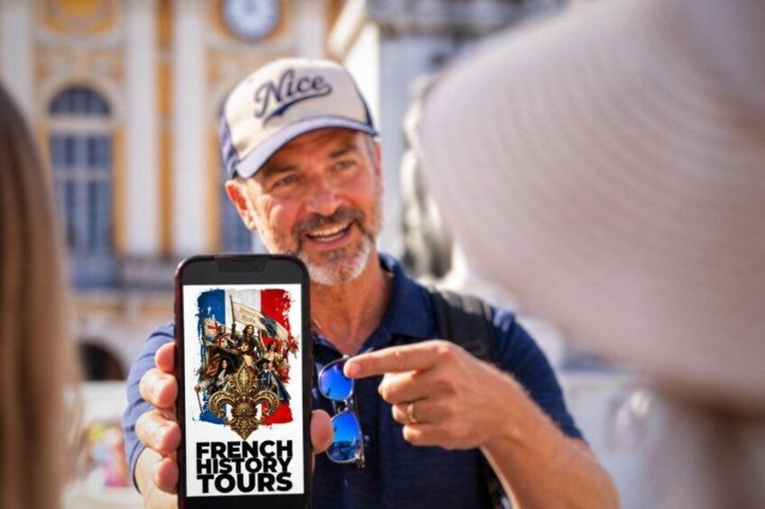 A person holding a smartphone displaying a French history tour app. 4