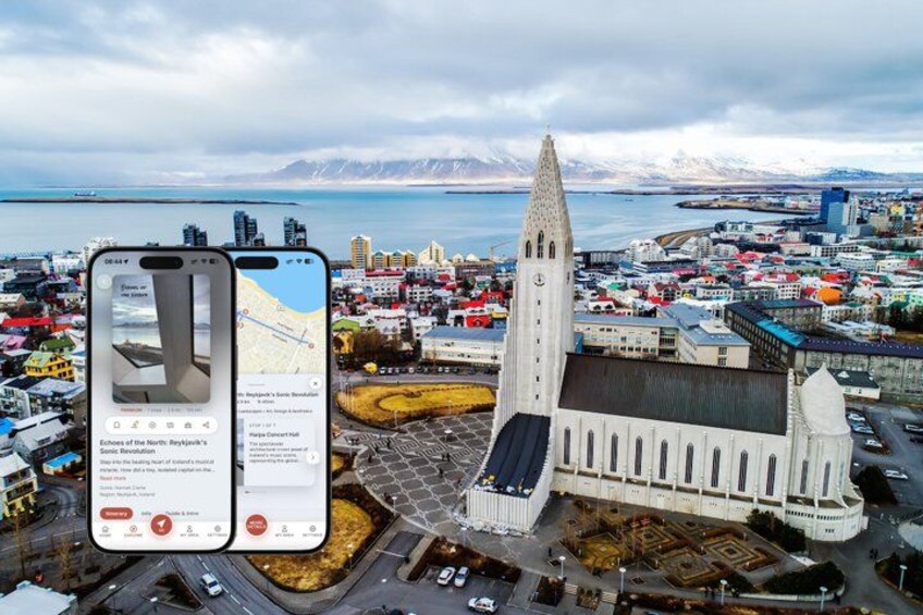 A smartphone displaying a map with a view of a cityscape, including a prominent church and a mountain range in the background. 1