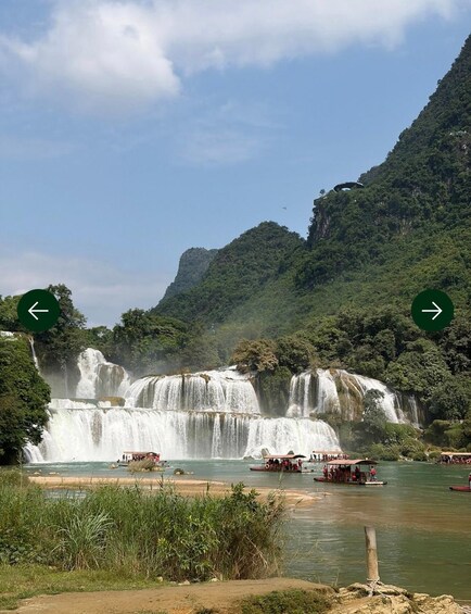 A waterfall with boats and a viewing platform. 3