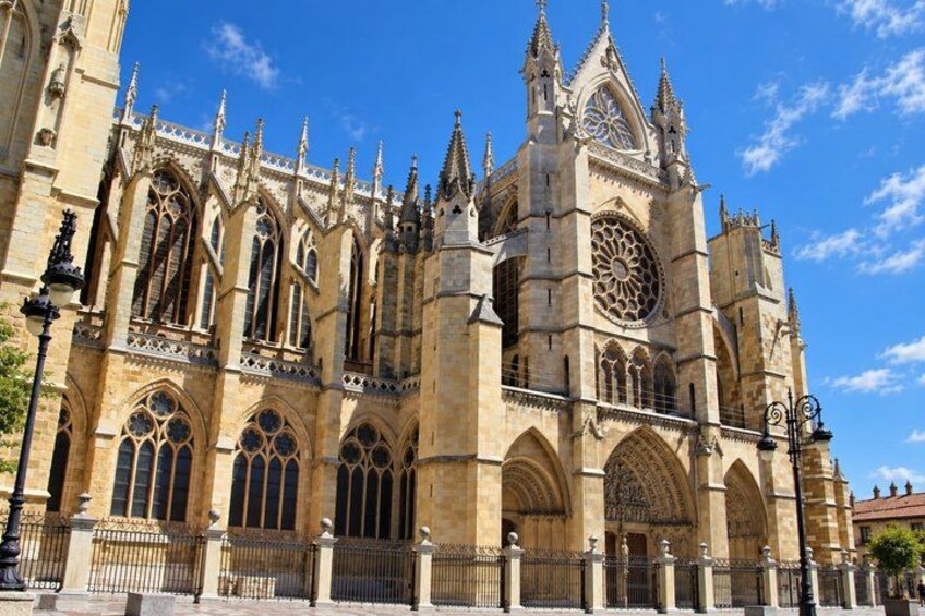 A Gothic cathedral with pointed arches and a large rose window. 2