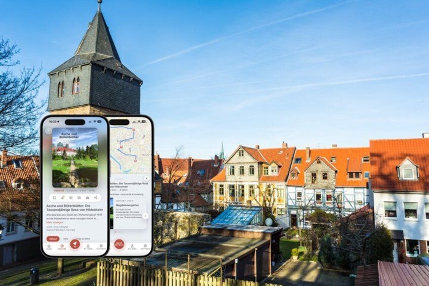 A smartphone displaying a map and a view of a town with traditional buildings and a church tower. 1