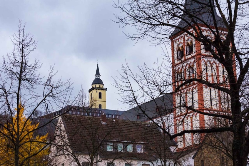 A church with a prominent bell tower and a smaller spire. 3