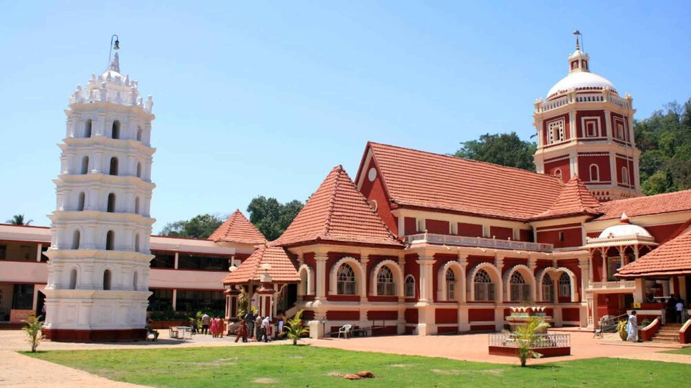 A historical building with a bell tower and a dome. 4