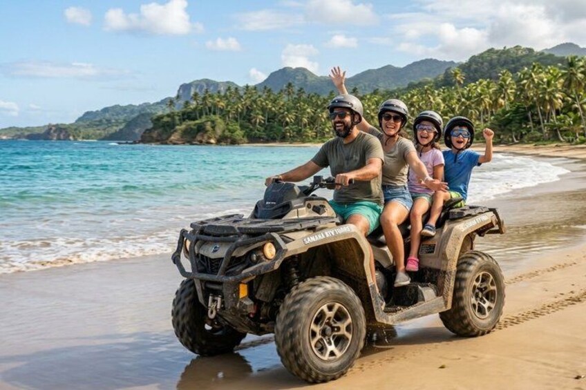A vehicle on a beach with water and palm trees in the background. 1