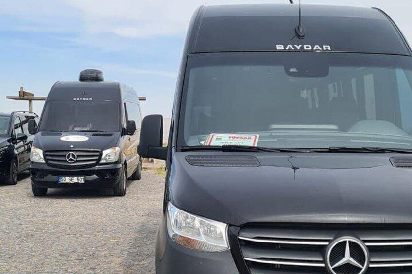 Two Mercedes-Benz Baydars parked on a gravel surface. 5