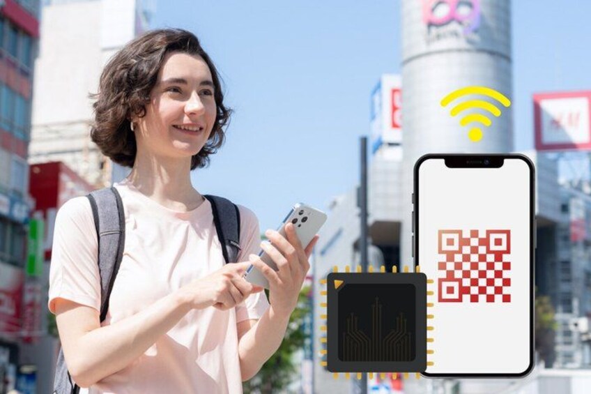 A person holding a smartphone with a QR code displayed on the screen, standing in an urban environment with buildings and a clear sky. 2