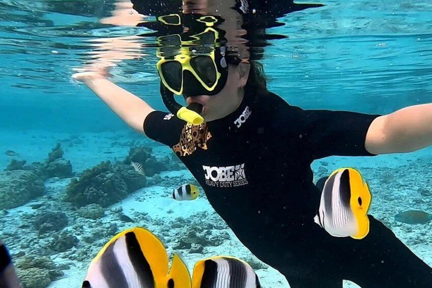 Swim among the colorful fish of the famous Taha'a Coral Garden. 2