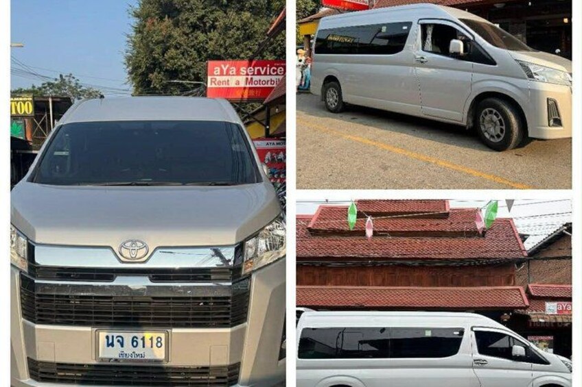 A silver van parked in front of a building with a red roof and a sign that reads 'aYa service Rent a Motorbike.' 2