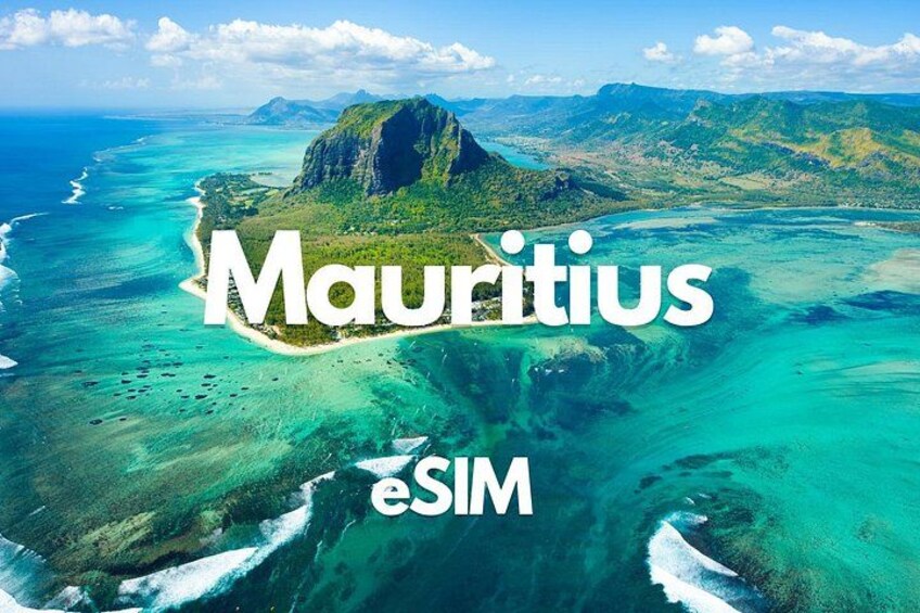 A tropical island with clear turquoise waters and lush greenery. 1