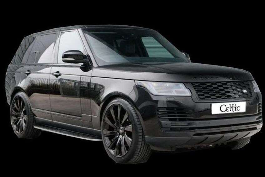 A black SUV with a 'Celtic' license plate. 3