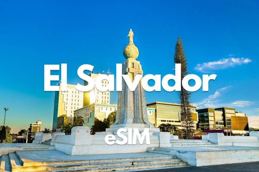 A statue in front of a modern building with the text 'EL Salvador' and 'eSIM' on it. 1