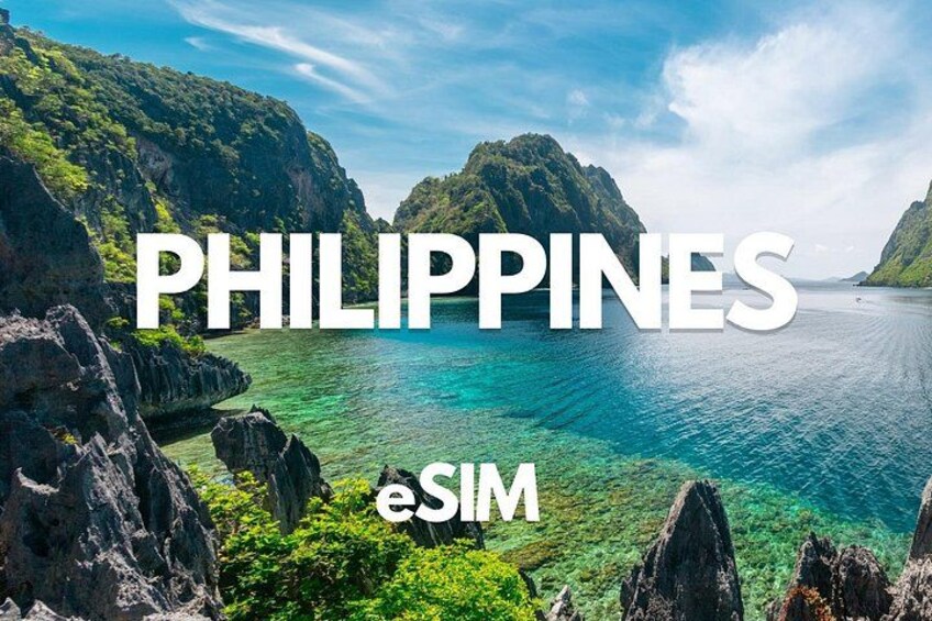 A coastal landscape with clear turquoise waters, rocky cliffs, and lush greenery. 1