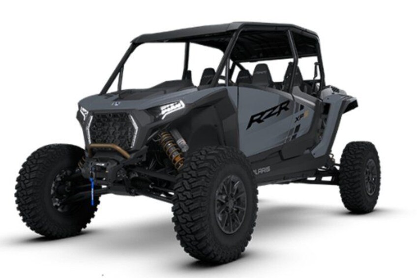 A black off-road vehicle with large tires and a rugged design. 2
