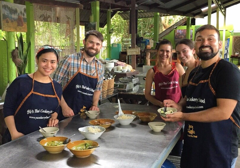 Participants pose with their dishes