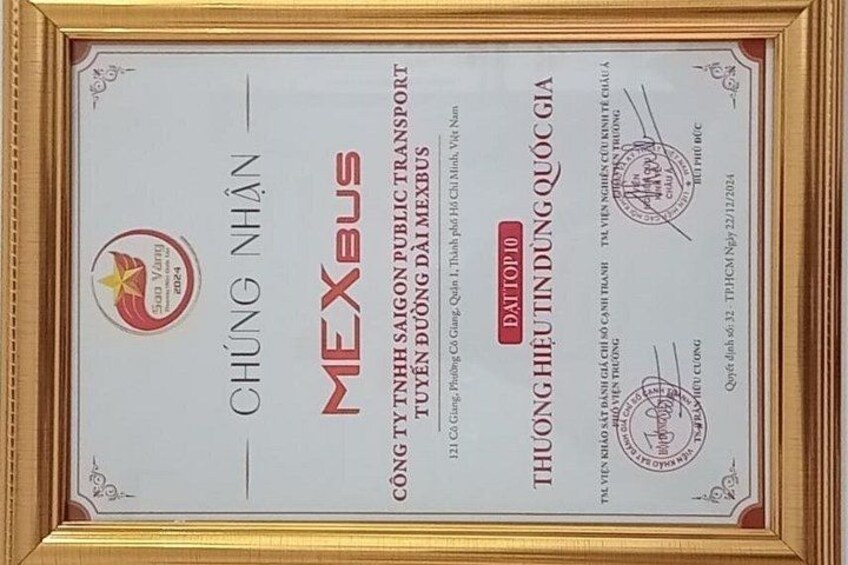 A framed certificate with text and logos. 2
