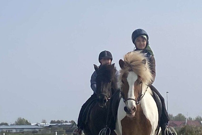 Two people riding horses. 3