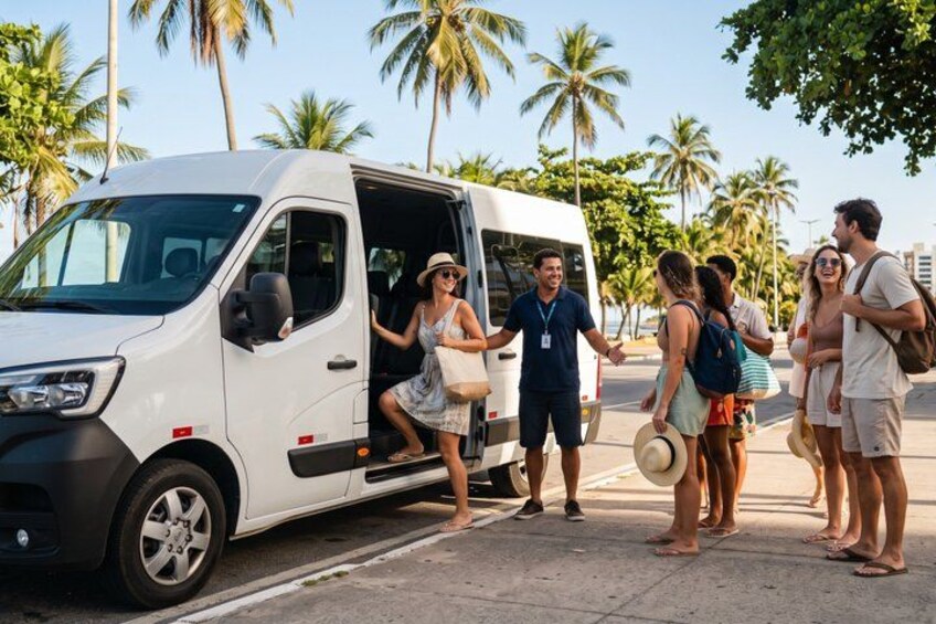 A white van parked on a street with palm trees in the background. 3