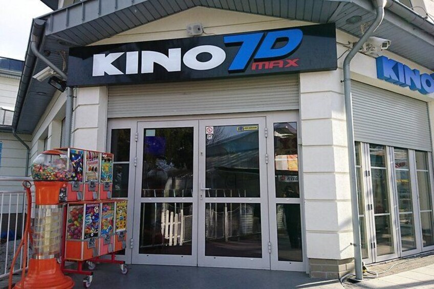 A KINO7D MAX cinema with a storefront and entrance. 3