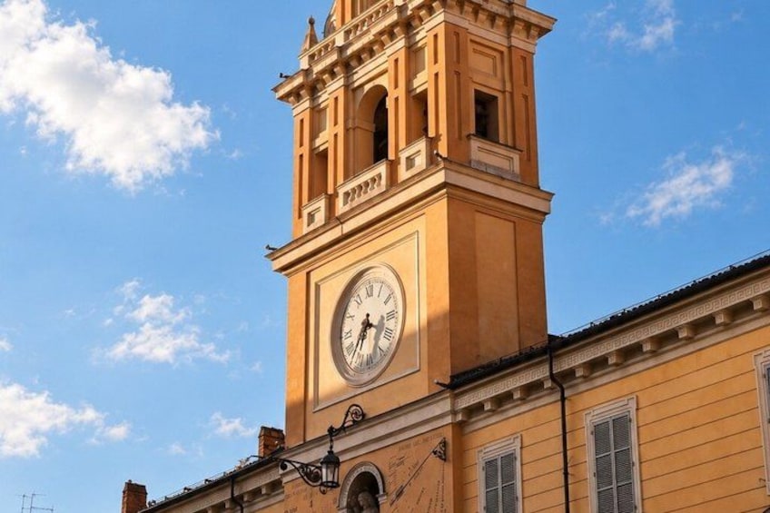 A clock tower with a clear sky in the background. 5