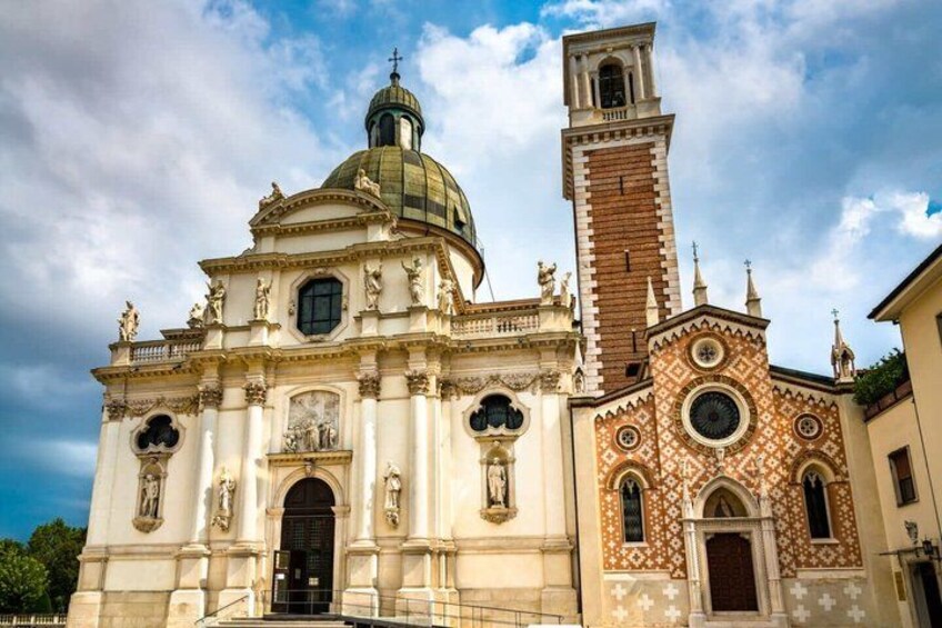 A historic church with a dome and bell tower. 5