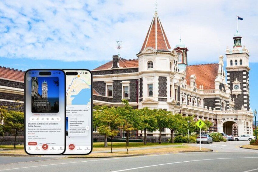 A historic building with a clock tower and a street in front. 1
