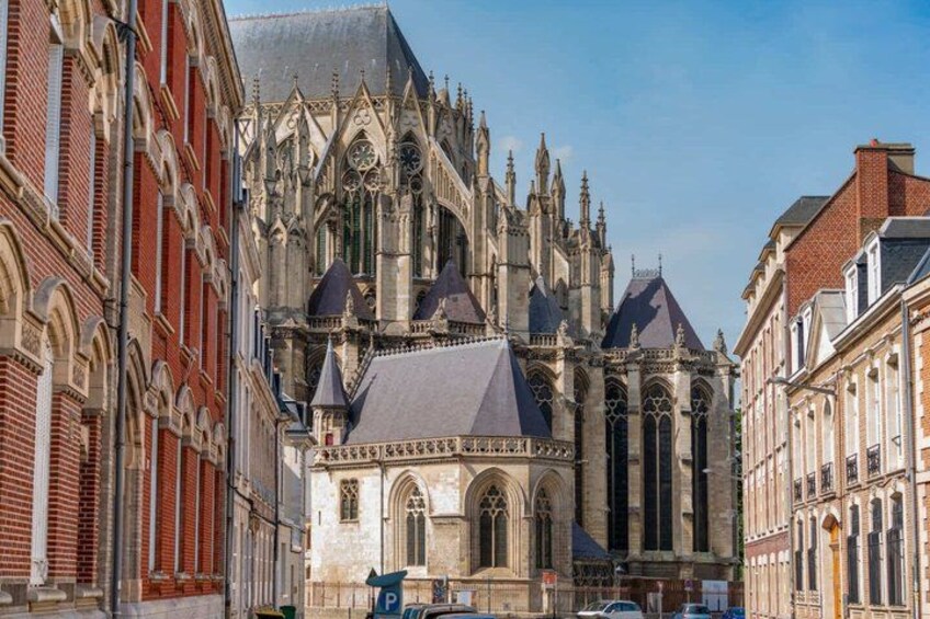 A Gothic cathedral with pointed arches and a clock tower. 5