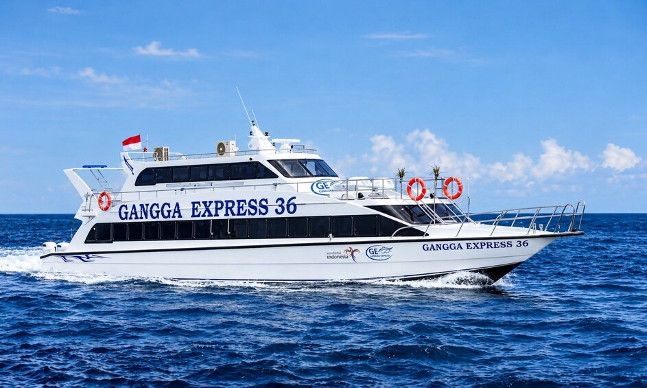 A white boat named GANGGA EXPRESS 36 on the water. 3