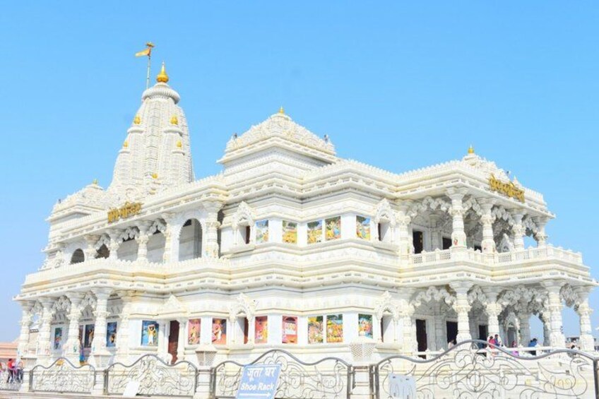 A white temple with multiple spires and intricate carvings. 3