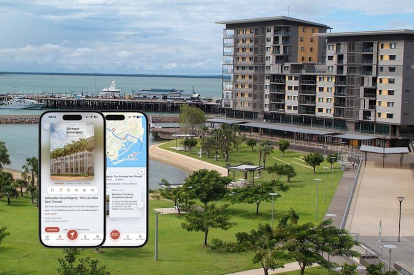 A smartphone displaying a map with a coastal cityscape, including a pier and high-rise buildings. 1