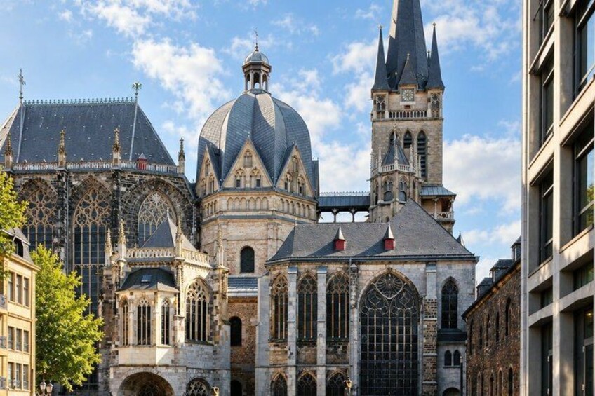 A historic cathedral with a large dome and a tall spire. 2