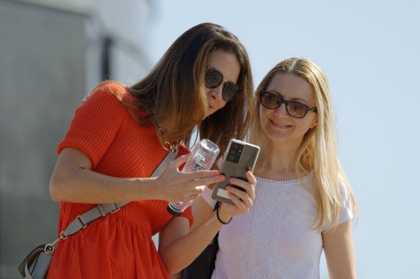 Two people holding smartphones. 4