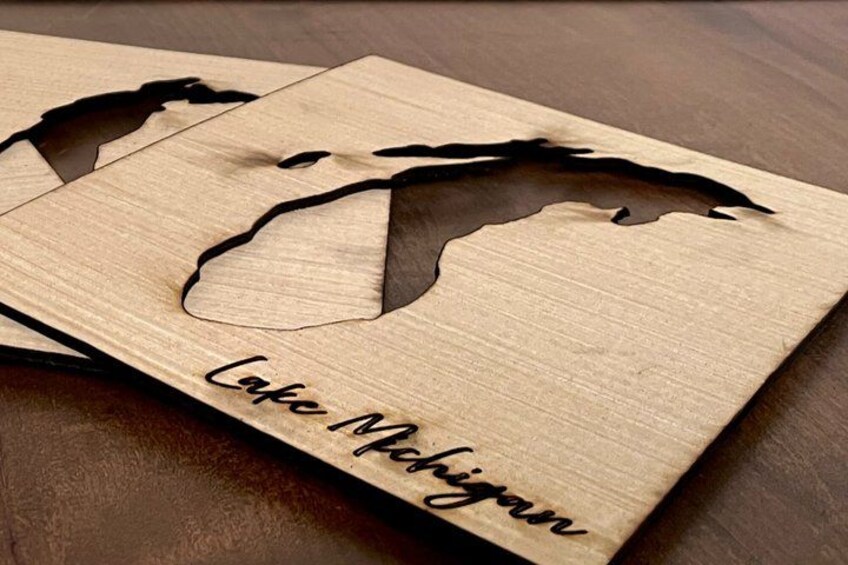 A wooden board with a cut-out of a horse and the text 'Lake Michigan.' 5