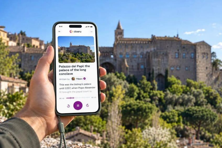 A smartphone displaying a travel guide for 'Palazzo dei Papi' with a historic building in the background. 1