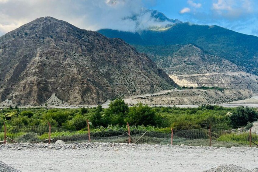 A mountainous landscape with a clear sky. 3