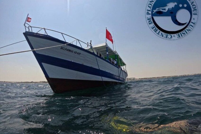 A boat named DELPHINUS 50 639 on the water. 4