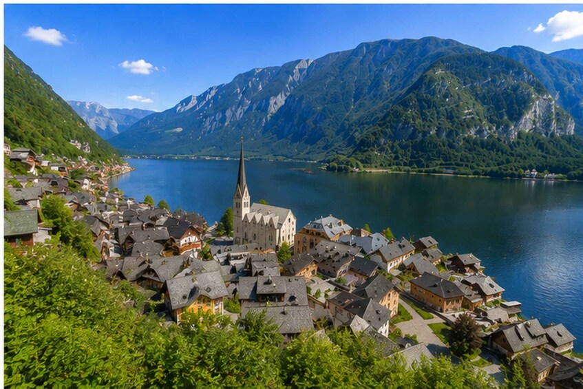 A lakeside village with a prominent church, surrounded by mountains and dense greenery. 2