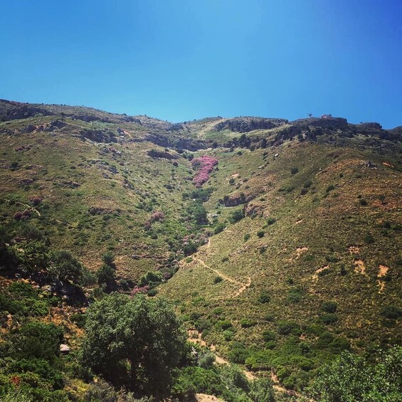 A mountainous landscape with a clear sky. 3