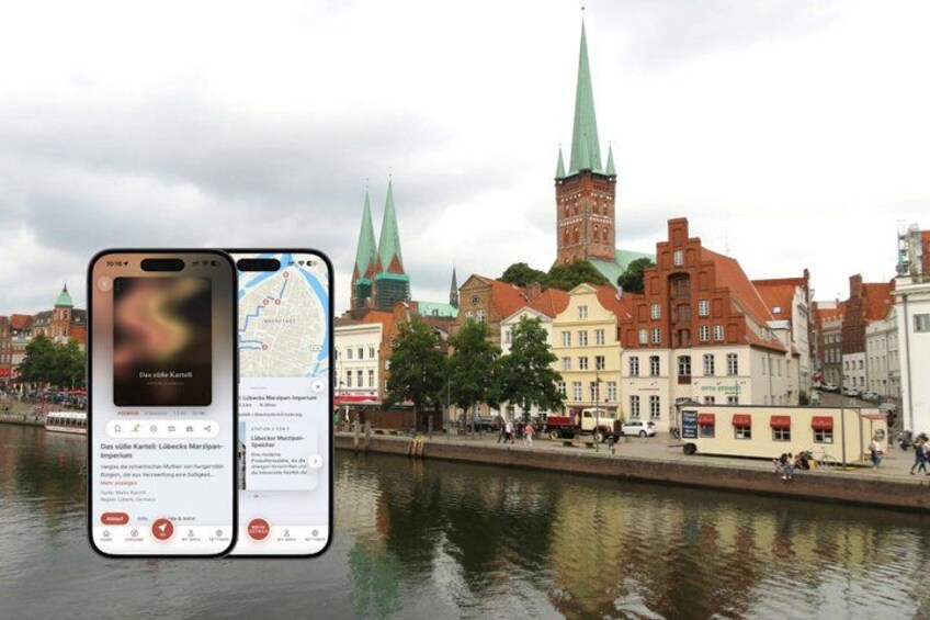 A smartphone displaying a map with a cityscape in the background, including a prominent church with a green spire. 1