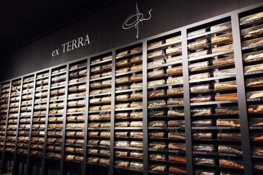 A wall of baked goods in a bakery. 5