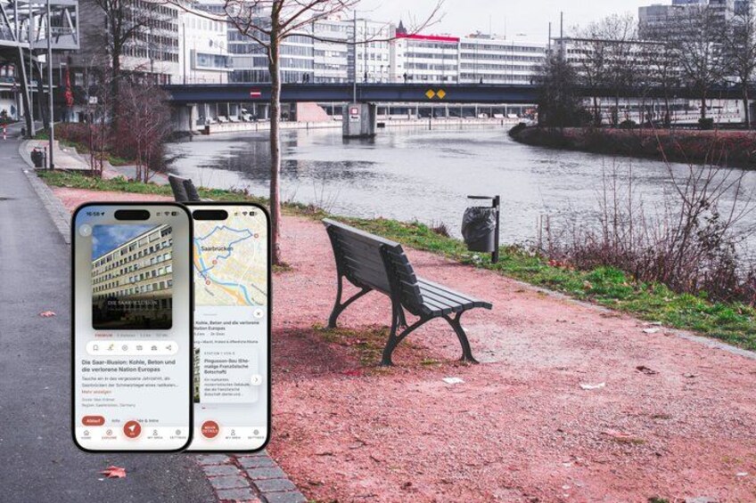 A smartphone displaying a map with a river and a bridge in the background. 1